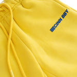CINNAMON BABY PRIMARY TRACK PANTS - YELLOW