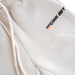 CINNAMON BABY PRIMARY TRACK PANTS - STONE