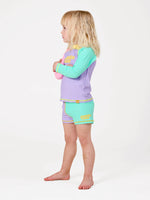 GOLDIE + ACE SPLICE BEACH RASHGUARD