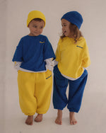 CINNAMON BABY PRIMARY TRACK PANTS - YELLOW