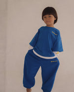 CINNAMON BABY PRIMARY TRACK PANTS - BLUE