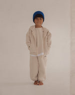 CINNAMON BABY PRIMARY TRACK PANTS - STONE