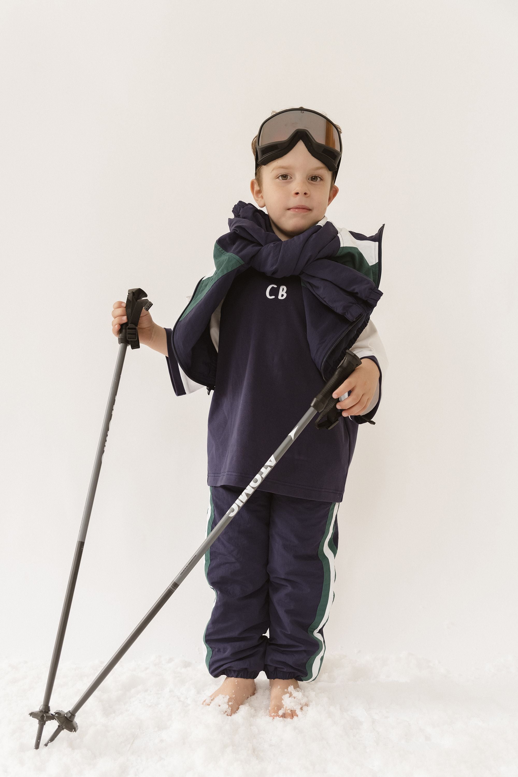 Cinnamon baby raglan tee with navy blue sleeves – soft cotton toddler shirt for boys and girls, perfect for everyday wear.