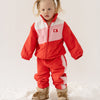 Cinnamon baby spray jacket in cherry red, lightweight and water-resistant toddler outerwear for all-weather comfort.
