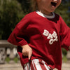BABY O THE LABEL TEDDY LOGO T-SHIRT - CRIMSON