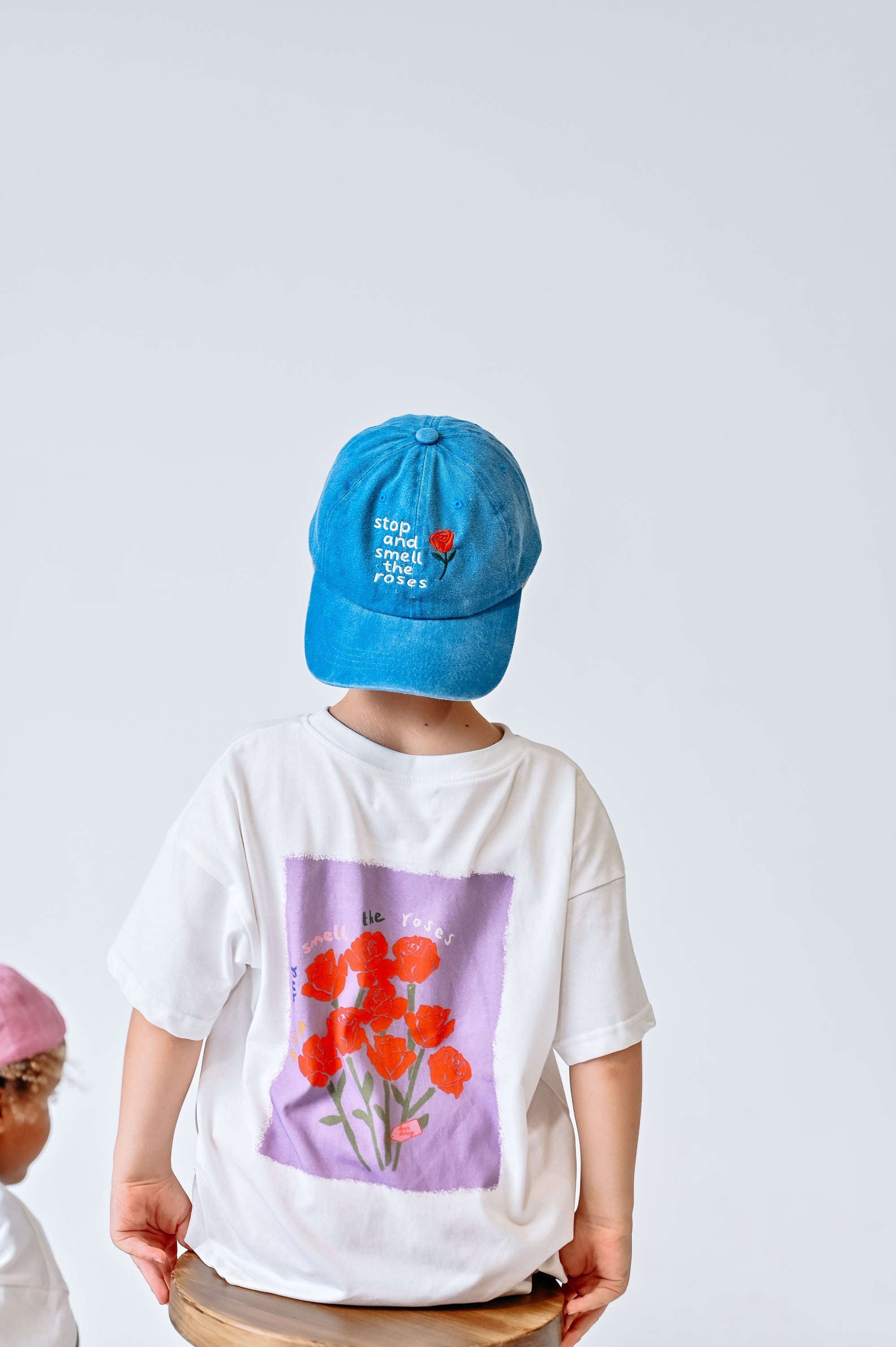 DEAR DARCY STOP AND SMELL THE ROSES CAP - BLUE