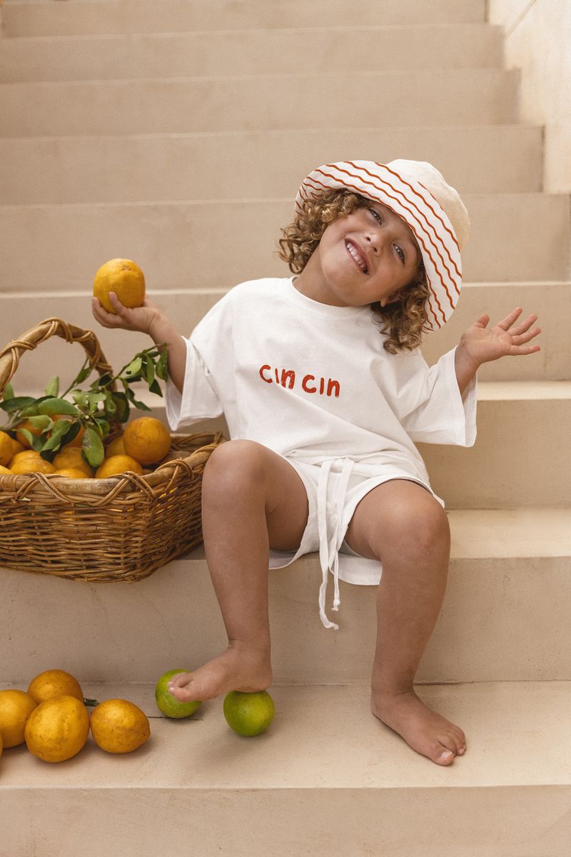 CINNAMON BABY REVERSIBLE BUCKET HAT - TANGERINE